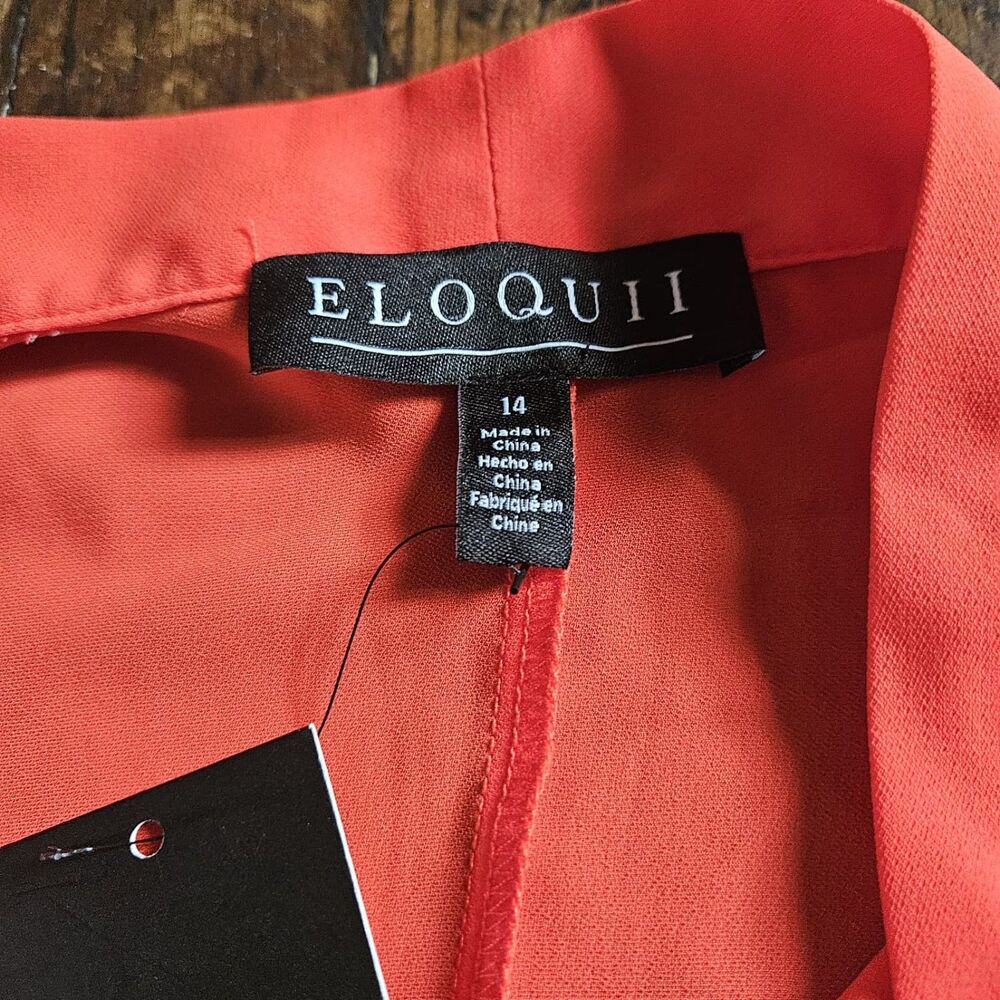 Eloquii coral-orange blouse chic tie-neck detail and fluid, flared short sleeves